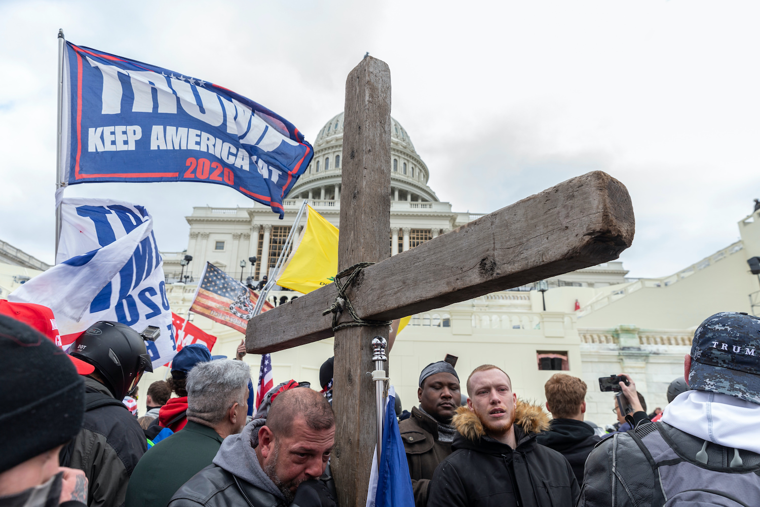 Washington, DC - January 6, 2021: Pro-Trump protester with Christian Cross seen during rally around at Capitol building