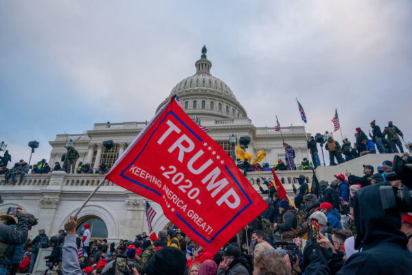WASHINGTON, D.C., UNITED STATES - JANUARY 6, 2021: President Donald Trump supporters storm the United States Capitol building.