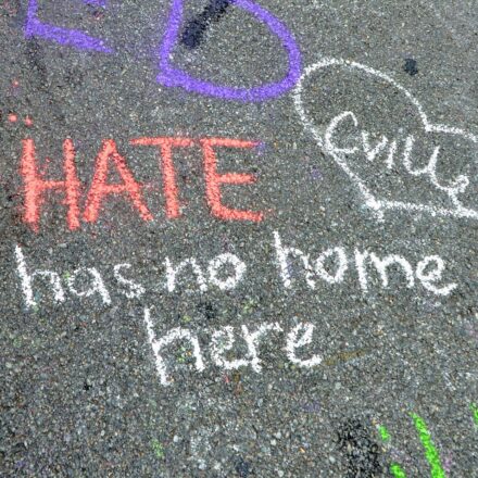 CHARLOTTESVILLE, VA – Aug 11, 2018: Chalked messages at the site where Heather Heyer was killed on the one-year anniversary of a rally that turned violent.