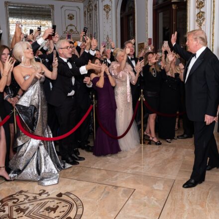 President Donald J. Trump and First Lady Melania Trump are greeted by guests as they arrive to the New Year’s Eve celebration Tuesday evening, Dec. 31, 2019, at Mar-a-Lago in Palm Beach, Fla. (Official White House Photo by Tia Dufour)