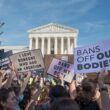 WASHINGTON, DC - OCT. 2, 2021: Women's March in Washington demanding continued access to abortion after the ban on most abortions in Texas, and looming threat to Roe v Wade in upcoming Supreme Court.
