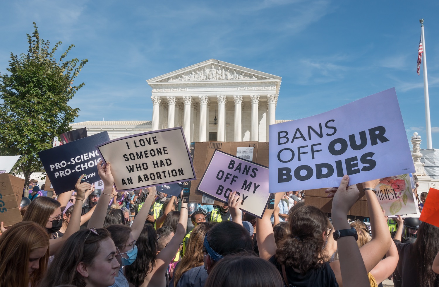 WASHINGTON, DC - OCT. 2, 2021: Women's March in Washington demanding continued access to abortion after the ban on most abortions in Texas, and looming threat to Roe v Wade in upcoming Supreme Court.