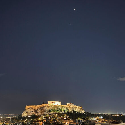 A photo of he Parthenon temple at night in Athens, Greece.