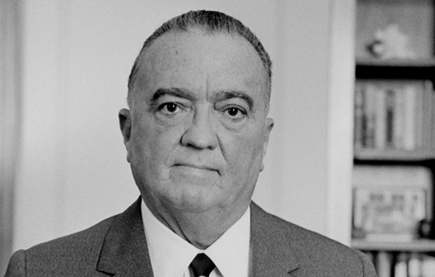Photograph shows FBI director J. Edgar Hoover, half-length portrait, facing front. Photo taken in 1961 by Marion S. Trikosko.