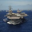 The Nimitz-class aircraft carrier USS Ronald Reagan leads a mass formation of ships from Korea, Taiwan, Japan, Singapore, France, Canada, Australia and the USA. Pacific Ocean July - 24, 2010.