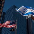 United States of America National Flag and the flag of the State of Israel flying side by side on flag poles in the wind, red, white, blue, six pointed star, David, American, Israeli, Jewish, stripes