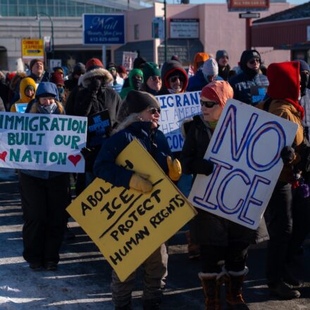 Minneapolis, Minnesota, USA, December 12, 2025—Hundreds of people gather to protest against ICE raids, Trump and other political views during a cold day in Minnesota.